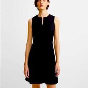 Theory split front black stretchy dress in size 6. Pristine condition